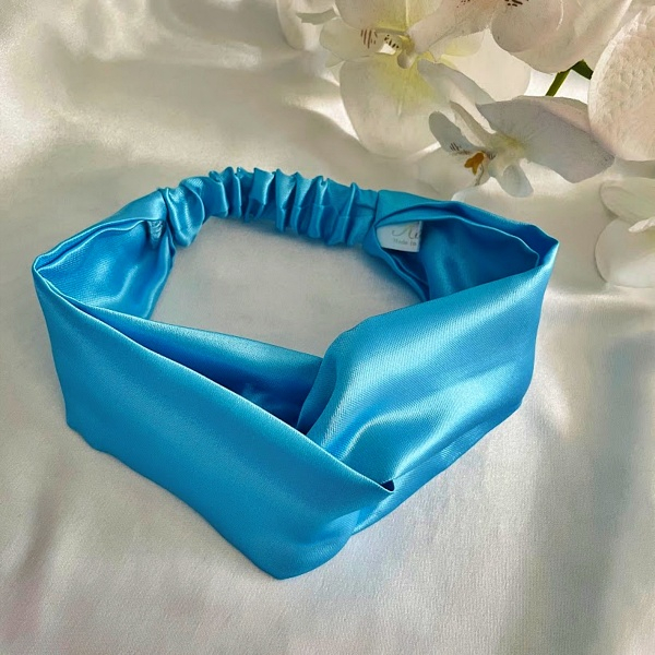 Bandeau torsadé en satin enfant bleu