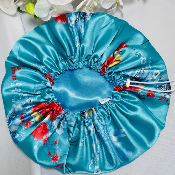 BONNET DE NUIT EN SATIN TURQUOISE MOTIF FLORAL